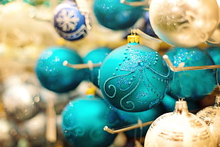 close-up photo of blue baubles