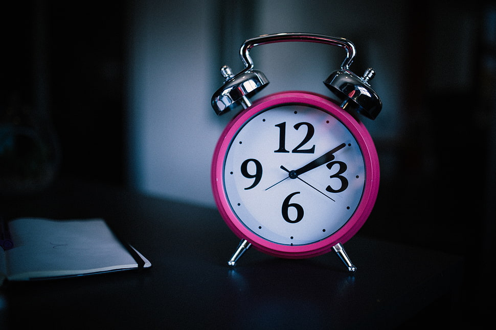round pink and white analog alarm desk clock HD wallpaper
