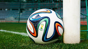 white and multicolored Adidas soccer ball, FIFA World Cup, soccer, Brazuca, balls
