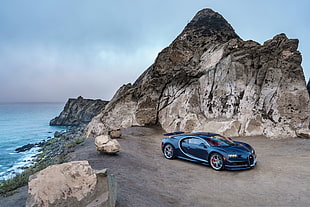 black Bugatti chiron coupe beside mountain HD wallpaper