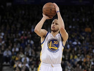Stephen Curry for the Golden State Warriors performing basketball jump shot