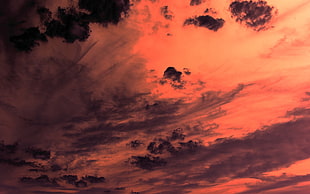 nimbus clouds under orange sky HD wallpaper