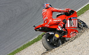 person riding on red Ducati sports bike, Moto GP, Casey Stoner, Ducati, racing