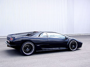 black Lamborghini Diablo on road HD wallpaper