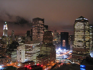 city buildings during night time, rush