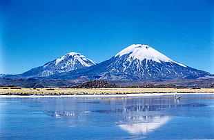 photography of mountain during day time, parinacota, pomerape