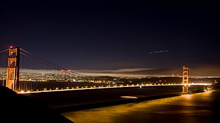 brown suspension bridge, bridge, city, night, architecture