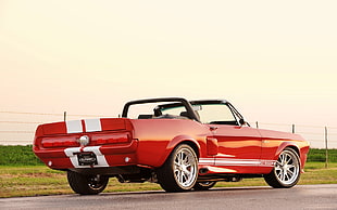red and white Ford Mustang convertible coupe