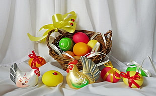 Easter Eggs and two hen figurines with basket HD wallpaper