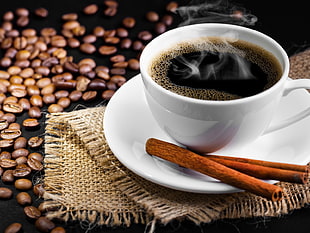 three bread sticks beside white ceramic coffee mug food photography