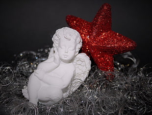 white ceramic angel figurine