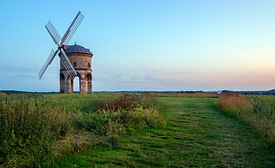 green grass field with windmill photo HD wallpaper