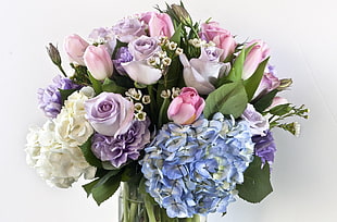 bouquet of white , purple , pink and green flowers