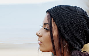 woman wearing black knitcap