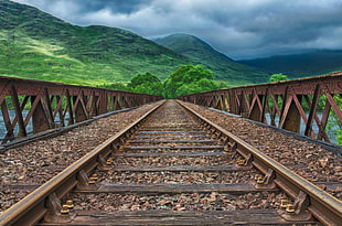 photography of train railroad during daytime HD wallpaper