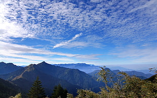 green mountain under blue sky at daytime