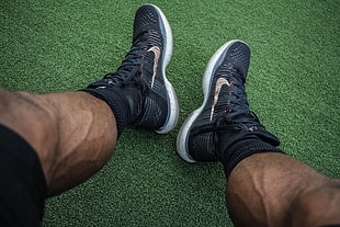 pair of black Nike running shoes HD wallpaper