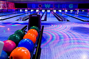 bowling on rack in a bowling alley