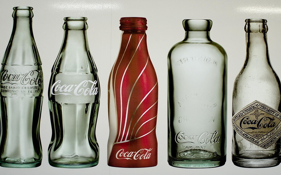 five empty bottle of Coca-Cola HD wallpaper