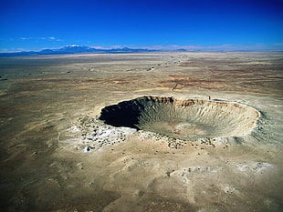landscape photography of crater during daytime