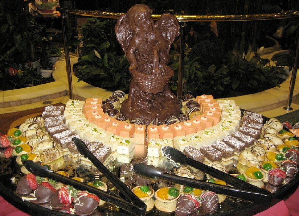 well arrange pastry with chocolate cherub HD wallpaper