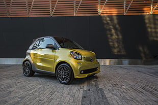 yellow compact car photography
