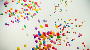 multi-colored balloons spread during daytime