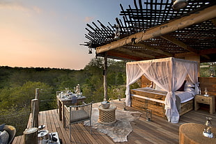brown wooden patio table with chairs, Lion Sands Reserve, South Africa, hotel, outdoors