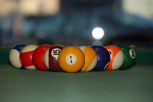 selective focus photography of billiard balls