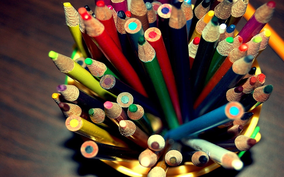 color pencil set on yellow container photo HD wallpaper