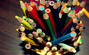 color pencil set on yellow container photo HD wallpaper