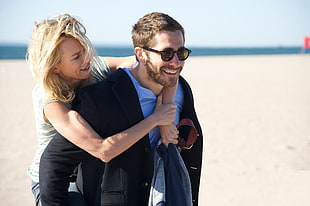 woman hugging woman in beach