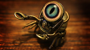 gold-colored insect decor, artwork, robot, spider