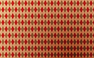 white, gray, and red argyle textile