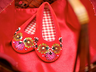 pair of red floral flat shoes HD wallpaper