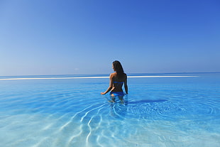 woman standing in body of water during daytime, women, bikini, blue bikinis, wet body HD wallpaper