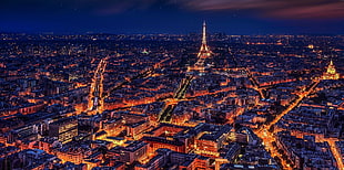 landscape photo of Paris city seeing Eiffel Tower with buildings lights at night time HD wallpaper