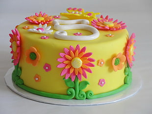 yellow with pink and orange Dahlia flowers accent fondant cake