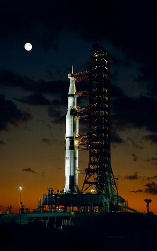 white and black space rocket ship, Saturn V, rocket, launch pads, NASA