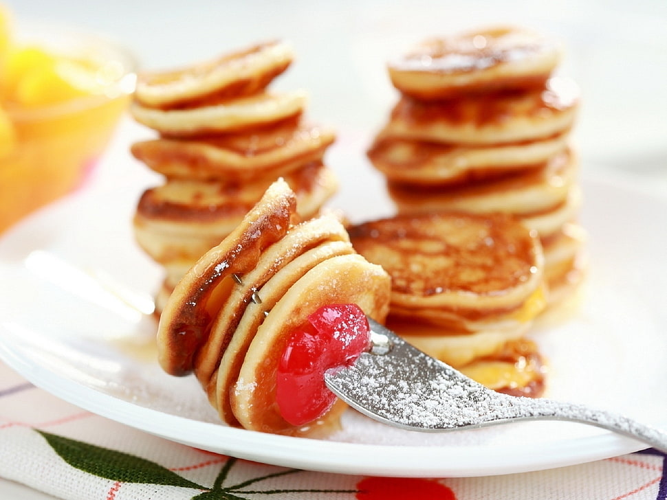 pancakes with cherry on top and silver-colored fork HD wallpaper