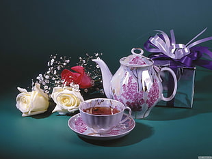 white-and-pink floral ceramic tea set