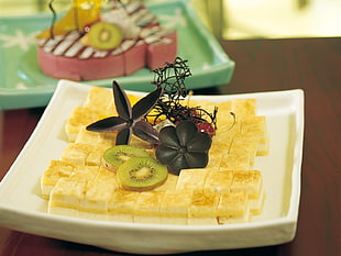 baked food with slice kiwi and black star fruit