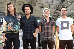 One Direction standing on stage during daytime HD wallpaper