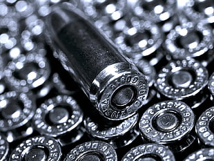 macro photography of silver bullet cartridges