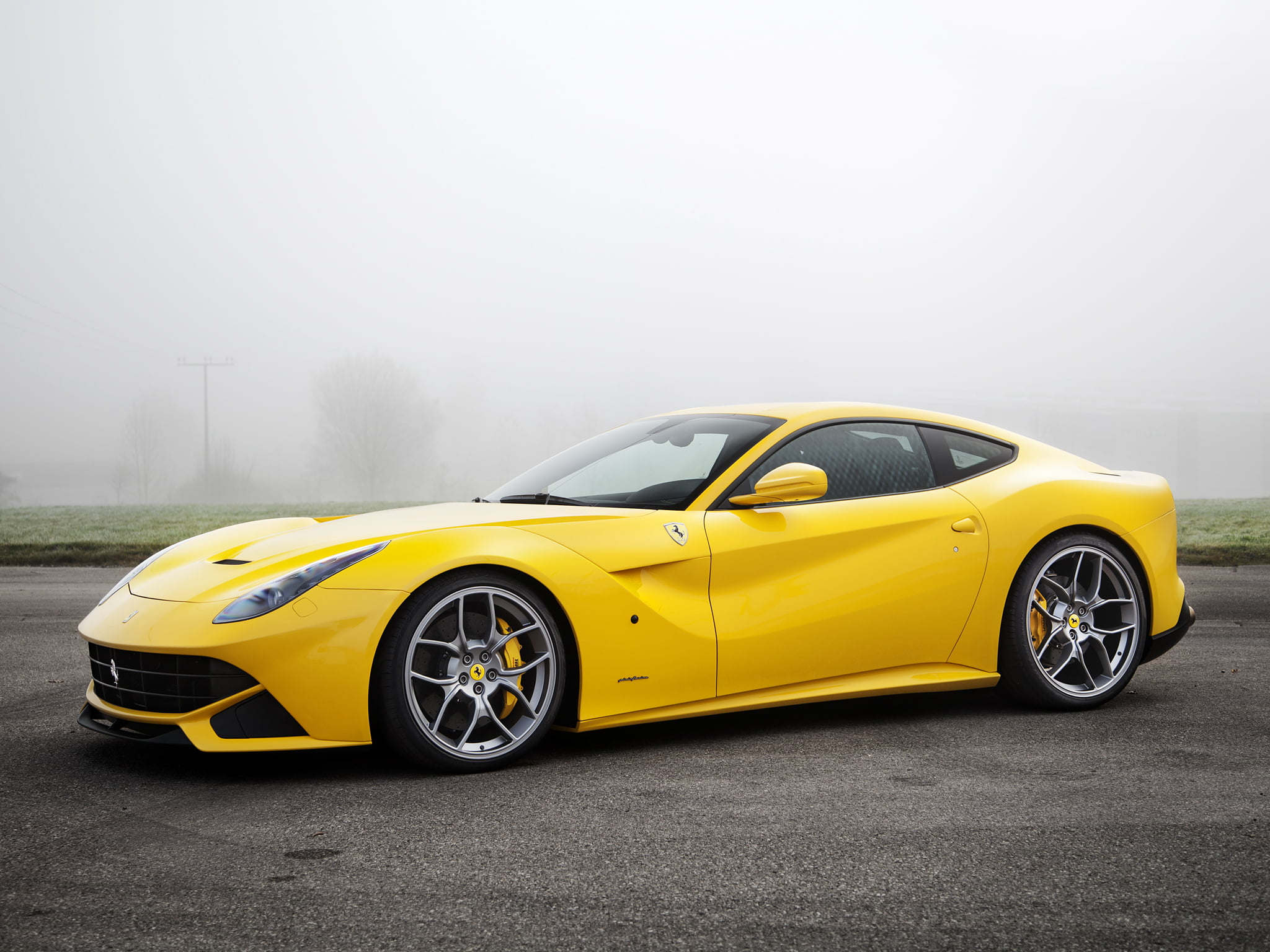 yellow Ferrari F12 TDF