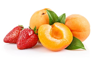 strawberries and orange fruit