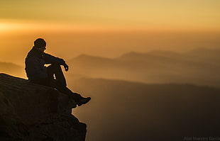 silhouette photography of man on top of mountain HD wallpaper