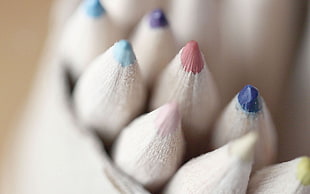macro photography of colored pencils