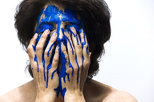 woman with blue face paint