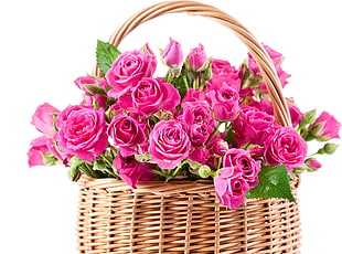 brown woven basket with pink flowers